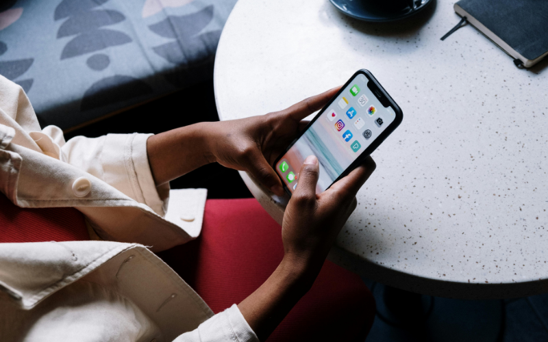 A person is checking if the free government iPhone legit program is real and trustworthy