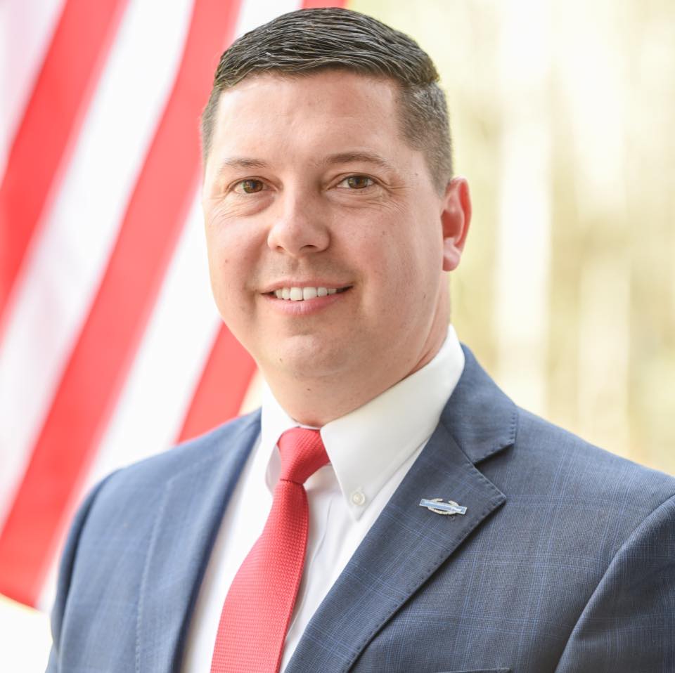  Representative Travis Moore